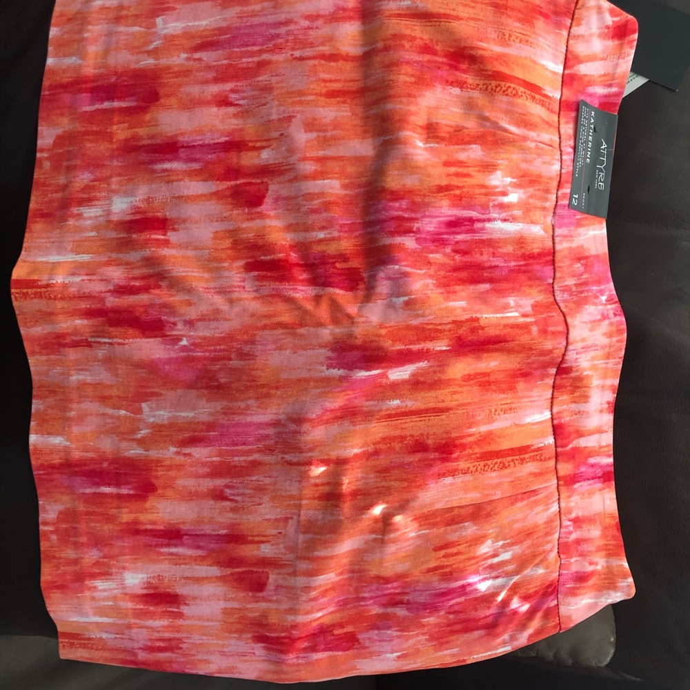 Performance skort by Attyre. Beautiful mix of vibrant colors. Nice stretch